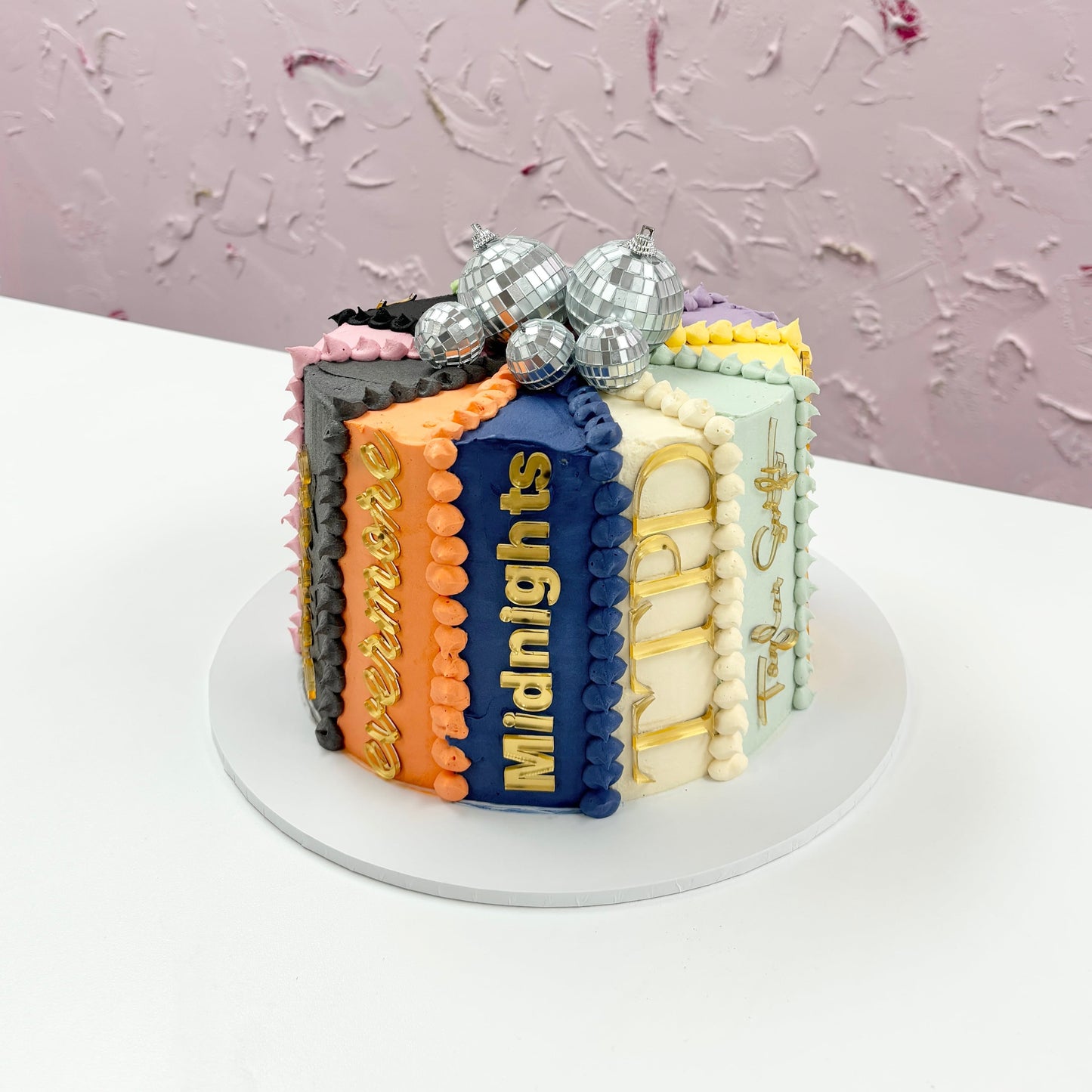 Cake by Sweeties By Dan showing acrylic name plaques