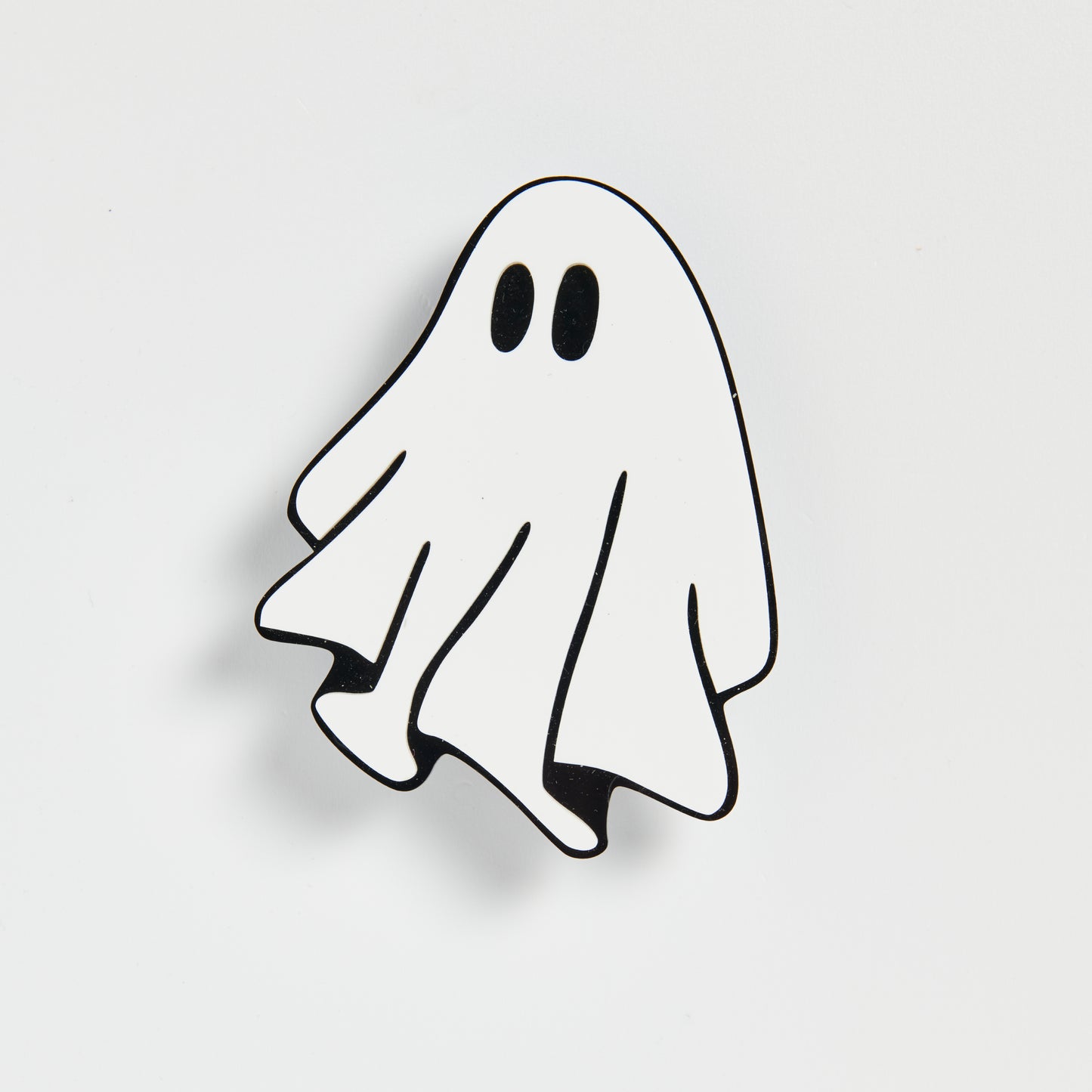 Photo shows a ghost made out of black and white acrylic.  