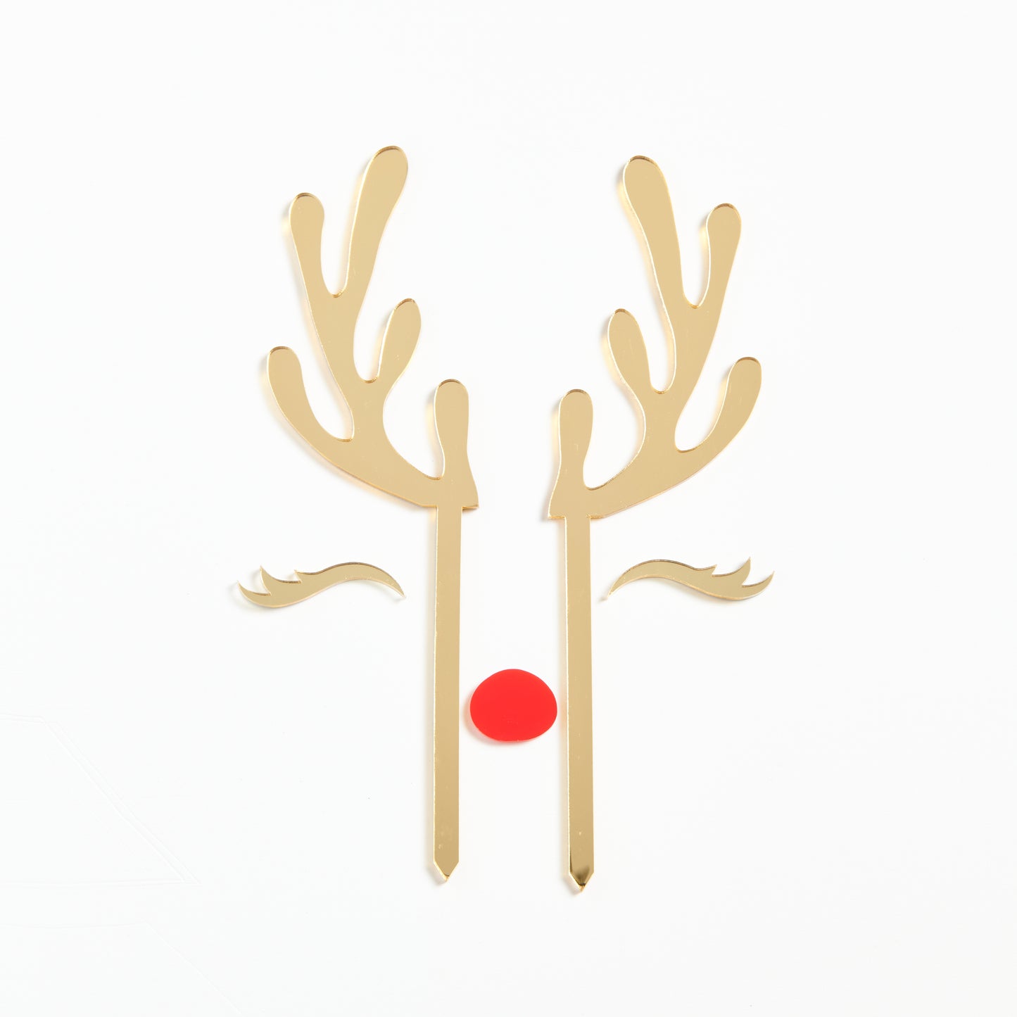 Product Photo of our Reindeer Cake Topper set in Gold Mirror with a red nose.