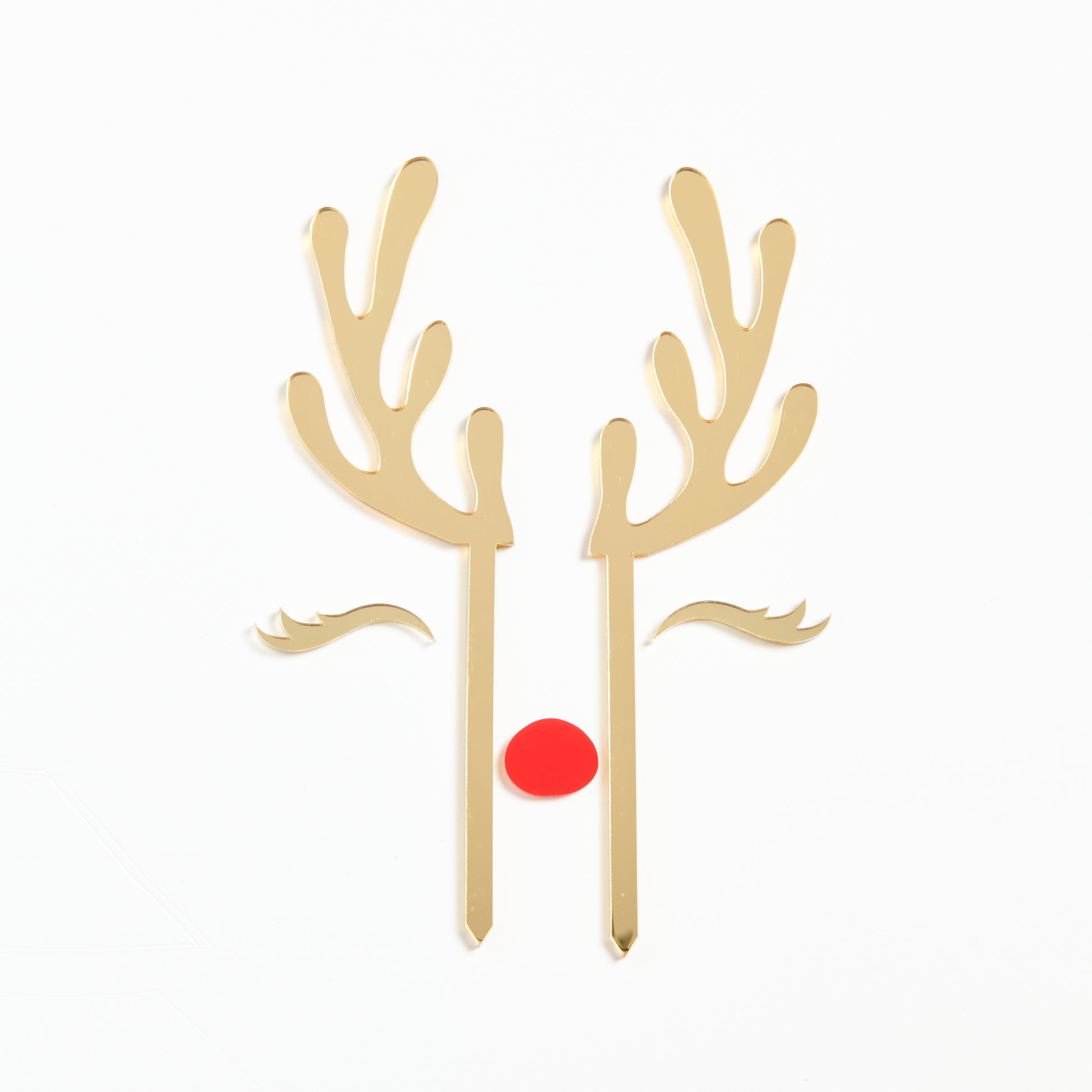 Product Photo of our Reindeer Cake Topper set in Gold Mirror with a red nose.