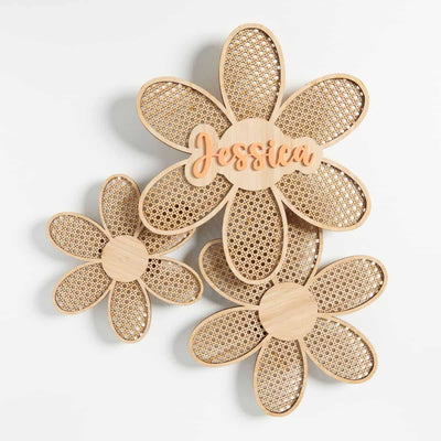 Image of our Rattan Flowers with the name Jessica in Orange acrylic.