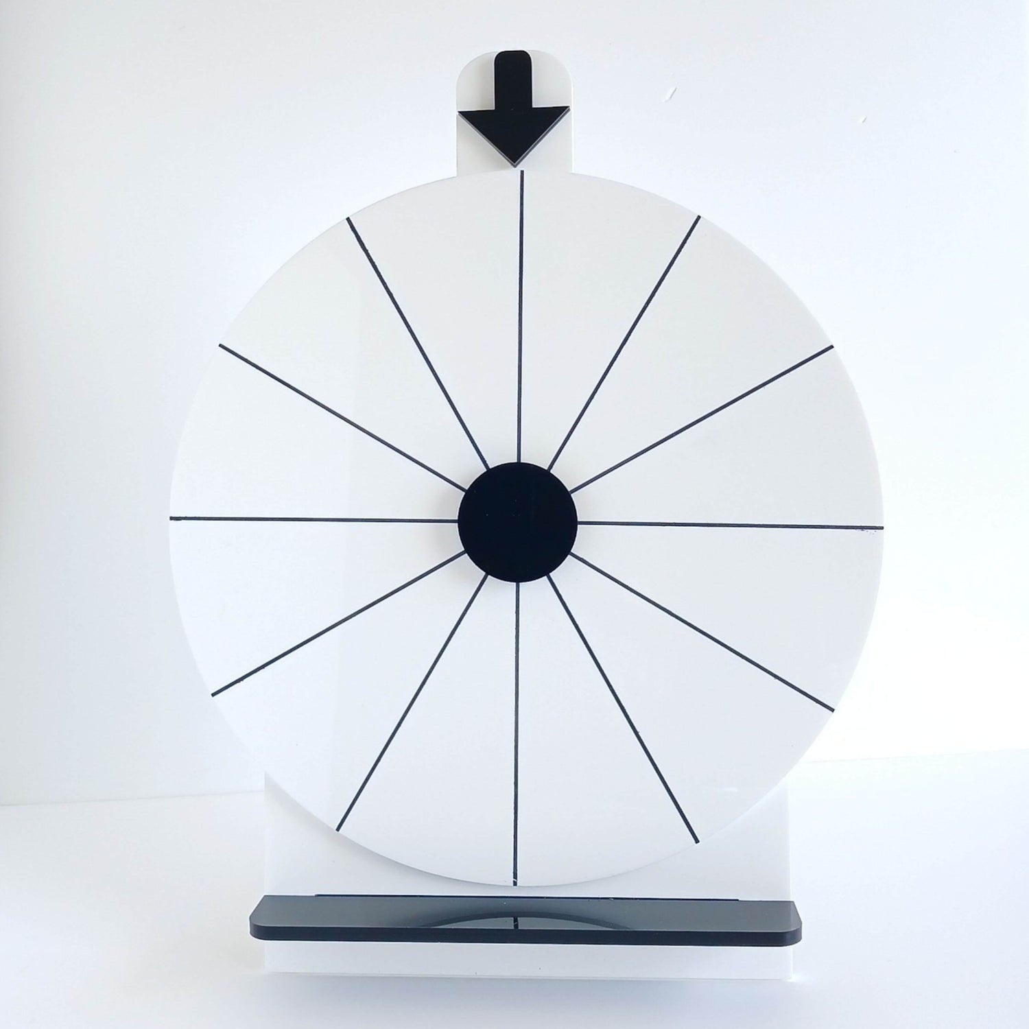 Image of a white faced Spinning Wheel.